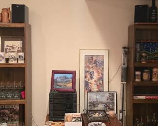 This wall is in the basement. I'm calling it the beer and wine wall. The two short tables were made in Denmark.
