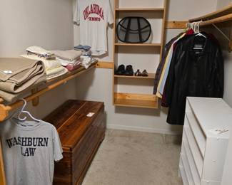 Main level bedroom closet. I spy a chest made from cedar, a white shelf, and some clothing (because you can't be naked all the time! GROW UP!!