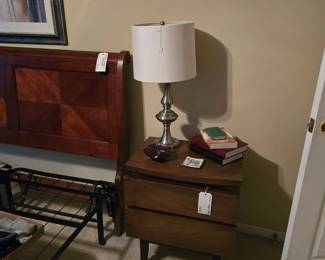 Main floor bedroom nightstand matches the dresser.