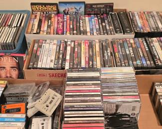 DVDs, CDs and audiocassettes. Lots without cases, but some great titles in there. I'll be testing a few while I am working.