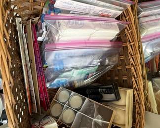 Wicker Storage Basket with Assorted Personal Care Items and Candles