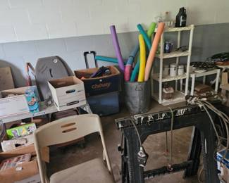 Pool noodles, storage shelves, household odds and ends, boxes, ropes, coolers, and enough random treasures to make this the official “I have no idea what category this belongs in” section.