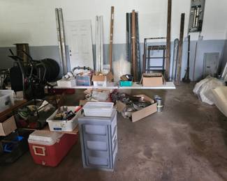 Garage and workshop goodies including tools, hardware, coolers, storage bins, ladders, building materials, pipes, fixtures, and plenty of random stuff you probably did not know you needed until you saw it.