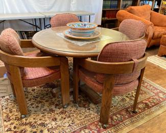 game table and four rolling chairs