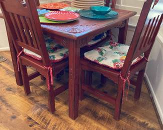 carved wood square table and chairs