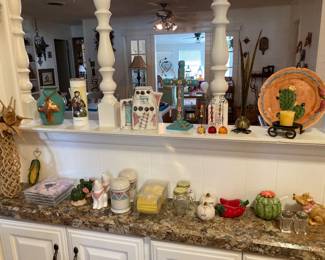 salt and pepper sets, "adobe" teapot, etc.