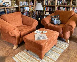 burnt orange arm chairs and ottoman, sand art, Navajo rug