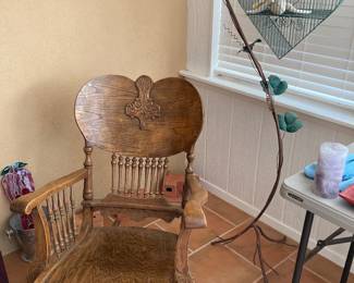 antique rocker, heart-shaped birdcage on stand