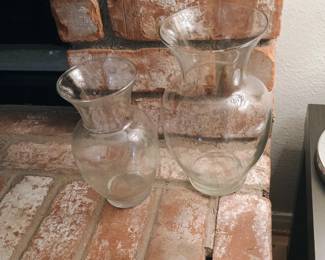 Matching pair of clear glass ginger-shaped floral vases. Thick, heavy glassware bases.
