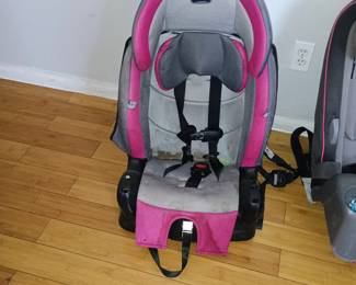 Evenflo Chase Plus 2-in-1 Combination Booster Safety Car Seat with integrated cup holders.