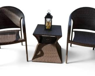 Two Brown Rattan Side Chairs And Side Table