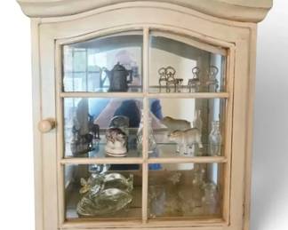 Hanging Curio Cabinet With Trinkets