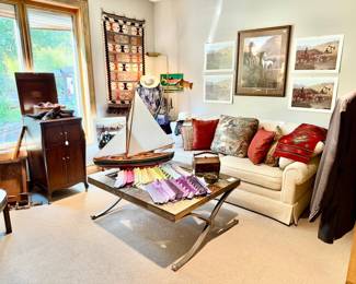 MEN'S ROOM WITH WESTERN ART, NAME BRAND TIES, KILIM VICTROLA CABINET.
