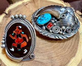 MUDHEAD AND BEAR CLAW BUCKLE AND STERLING RING.
