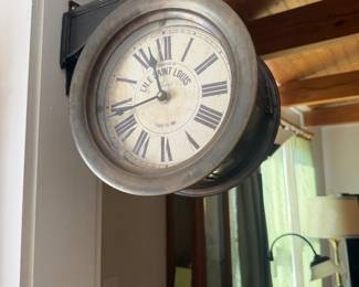 Two sided clock from a restaurant in Paris 