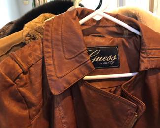Lots and lots of women's name brand jackets and coats in M / L