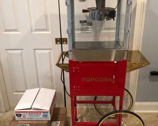 Rolling Popcorn cart with lots of extra supplies