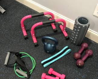 Lots of various workout equipment