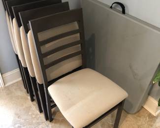 Lot of 6 folding metal chairs with padded seats and 6' folding table