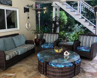 Outdoor seating group with rocker chairs and table with pull out seating