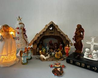 Nativity set, angel, and collection of various religious figurines and collectibles