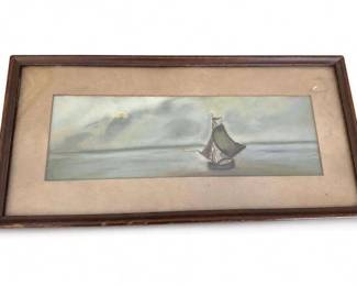 Framed coastal sailboat seascape pastel or print
Condition: Good
Horizontal framed artwork showing a lone sailboat on calm water beneath a cloudy sky with a pale sun/moon. The image appears soft and atmospheric, possibly a pastel, drawing, or print, but the medium cannot be confirmed from the photo alone. Frame and mat show light age/wear consistent with a decorative wall piece.