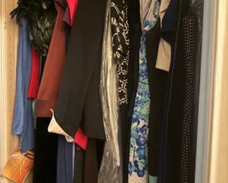 Mixed women's dresses and formalwear clothing lot
Condition: Good
Assorted women’s garments on closet hangers, dominated by long dresses and dressy pieces in dark solids and floral prints. Several items appear full-length; one or more garments are in a clear plastic cover. Condition cannot be fully assessed from the image, but the lot appears to be lightly to moderately handled with normal closet wear.