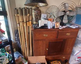 Ornate ceramic table lamp with black shade
Condition: Good
Large decorative ceramic table lamp with a black shade, floral/ornamental body, and gold-toned hardware. Appears to be one complete lamp; other nearby items in the photo are background estate-sale contents and are not counted as part of the primary item.