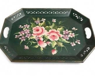 Vintage hand-painted octagonal green floral serving tray
Condition: Good
Octagonal dark green decorative serving tray with pierced rim accents, side handles, and a central pink-and-lavender floral bouquet. Visible surface wear and age-related edge rubs suggest a used vintage piece.
