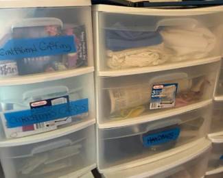 Clear plastic desktop drawer storage organizers, lot of 4 units
Condition: Good
Assorted clear/translucent plastic drawer organizers with white/light frames, used condition, some drawers holding miscellaneous contents and handwritten blue tape labels. No confirmed branding visible. Primary value is utilitarian resale rather than collectible interest.