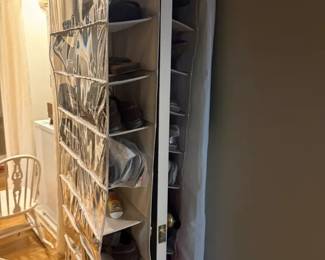 Over-the-Door Clear-Pocket Hanging Shoe Organizer
Condition: Good
Single hanging closet organizer with many vertical rows of pocket compartments, likely used for shoes or small accessories. Clear pockets and over-the-door format are visible; contents appear mixed and the organizer is in active use.
