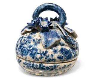 Blue and White Ceramic Lidded Basket-Style Trinket Box with Handle
Condition: Good
Round lidded ceramic decorative basket with integrated loop handle, blue floral decoration on cream ground, and crackle-like surface crazing. Appears to be a small trinket box, candy box, or decorative covered basket.