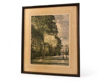Framed color etching or print of a European street scene
Condition: Good
Single framed, matted artwork showing a narrow European street or courtyard scene with buildings, trees, and a cloudy sky. Appears to be a color print or etching under glass in an older dark wood frame. The visible lower-right signature area is too small/blurry to identify. Frame and mat show age toning/wear consistent with estate-sale decor art.