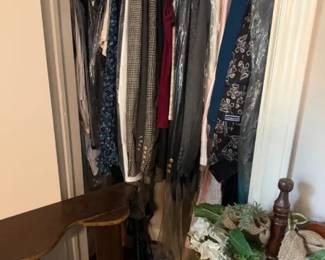 Mixed women’s closet clothing lot, assorted dresses tops and jackets
Condition: Good
Assorted garments packed tightly on a closet rack, likely women’s clothing. Visible items include multiple dresses or long tops, jackets or blazers, and patterned pieces. Condition appears used with no obvious major damage visible from this angle, but a full inspection of seams, stains, odors, and tags is needed.