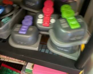 PowerBlock adjustable dumbbells, color-coded selector-pin style, lot of 6
Condition: Good
Assorted compact adjustable dumbbells in black/gray with colored selector handles/pins, stored together on a shelving unit. Likely a mixed lot of PowerBlock-style home gym weights rather than a single matched pair.