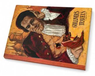 Gulliver's Travels illustrated hardcover book
Condition: Good
Vintage hardcover copy of Gulliver's Travels with a pictorial dust-jacketless or printed cover design showing a portrait-style illustration and the title printed on the front. Appears to be an older illustrated edition, but exact publisher/printing is unverified from the image alone.