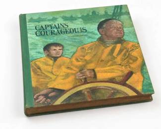 Rudyard Kipling Captains Courageous hardcover book
Condition: Good
Single hardcover copy of Captains Courageous by Rudyard Kipling, green-bound with illustrated front cover showing two figures in yellow rain gear and a ship's wheel. Likely a later/collector hardcover or school/library-style edition rather than a verified first edition; no dust jacket is visible.