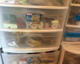 Sterilite 3-Drawer Plastic Storage Organizer Lot
Condition: Good
Plastic Sterilite drawer organizers used for craft/stationery storage. Clear/translucent drawers with white frames; visible mixed contents include ribbons, papers, tape, and small supplies. The lot appears well-used but intact from the visible front view.