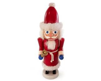 Wooden Santa Nutcracker Figurine
Condition: Good
Tall wooden Santa nutcracker figurine with red body, white faux-fur trim, blue gloves and blue eyes, white beard, rope belt, and a small bell. Decorative Christmas display piece; condition appears generally good from the front photo, but back, base underside, and any label are unverified.