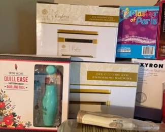 Xyron Creative Station craft machine lot with quilling tool and plaster craft supplies
Condition: Good
Mixed craft lot with Xyron Creative Station die-cut/emboss-style machine boxes, a QuillEase quilling tool set, a Plaster of Paris package, and other small craft supplies. Boxes appear stacked and may include duplicates or partial sets; condition looks generally good from the front-facing view, but contents and working status are unverified.