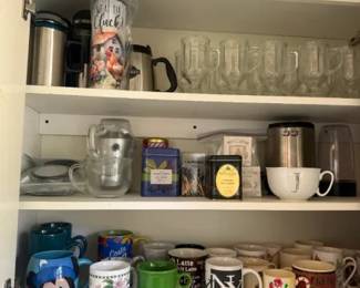 Assorted ceramic and glass coffee mug lot
Condition: Good
Eclectic shelf lot of mostly coffee mugs and cups in assorted materials and styles: ceramic novelty mugs, clear glass mugs, a few travel tumblers, and everyday kitchen drinkware. Condition appears generally used with normal shelf wear; no major damage is clearly visible from this photo, but individual inspection is still needed for chips, cracks, staining, and maker marks.
