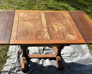 vintage Jacobean Revival solid oak drawleaf dining table