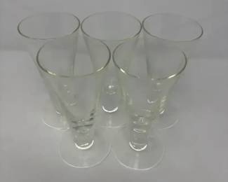 five clear, footed glass stemware pieces
