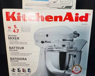 Red Kitchenaid Mixer And A Electric Knife