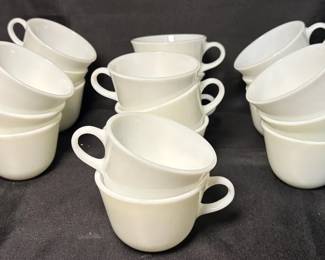 vintage Corning milk glass tea or coffee cup featuring the classic bottom makers mark and loop handl