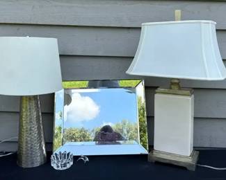 hammered silvertone metal table lamp, a small square beveled accent mirror, and a white Lamp