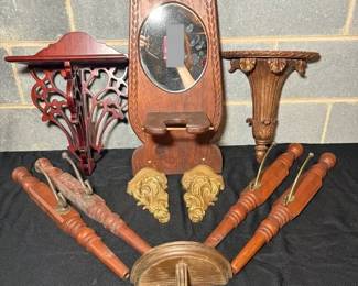 vintage and antique architectural wood pieces, including a central wooden wallhanging mirror