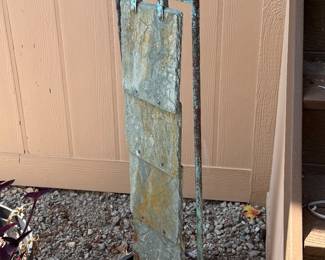 Rustic Outdoor Water Feature Fountain Add character and charm to your garden, patio, or outdoor space with this unique rustic metal water feature. Featuring a tall, narrow handcrafted-style design with beautifully weathered metal and natural patina, this piece has a wonderful aged industrial look.