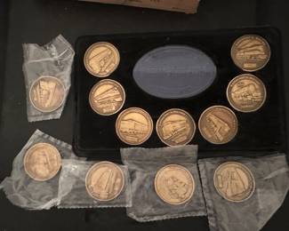 set of Model Railroader Dream-Plan-Build Railroad Collector Medallions featuring various vintage steam and diesel locomotives.