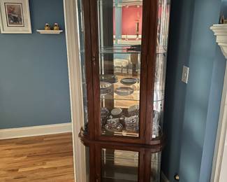 ;ighted curio cabinet